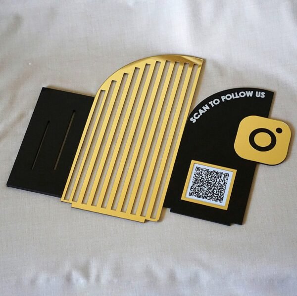 1000064643 single qr scan stand for social media in black and gold