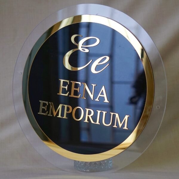DSC06224 (1) black and golden signage in circular shape with 3d embossed letters and logo