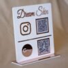 qr code scan stand in white and pink with payment and social media option