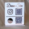 qr code scan stand in white and pink with payment and social media option