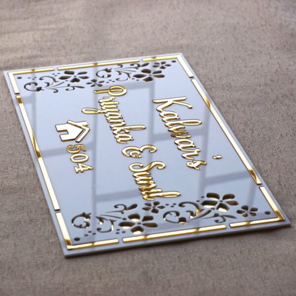 DSC06995 Rectangular white and gold nameplate with floral design, customizable name option.