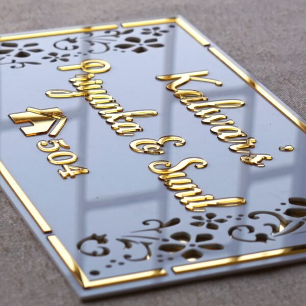 DSC06999 Rectangular white and gold nameplate with floral design, customizable name option.