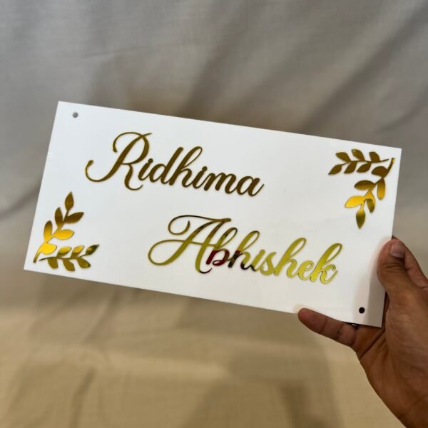 IMG_4023 Personalized Acrylic Name Plate in white and gold with leaf design on diagonal corners