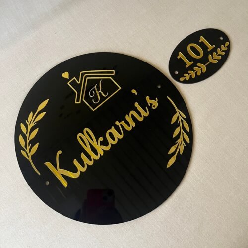 acrylic nameplate with numberplate in black and gold color and round shape
