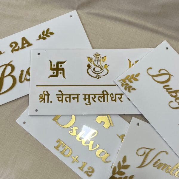 IMG_4560 multiple Personalized Acrylic Name Plates in white and gold with leaf design on diagonal corners