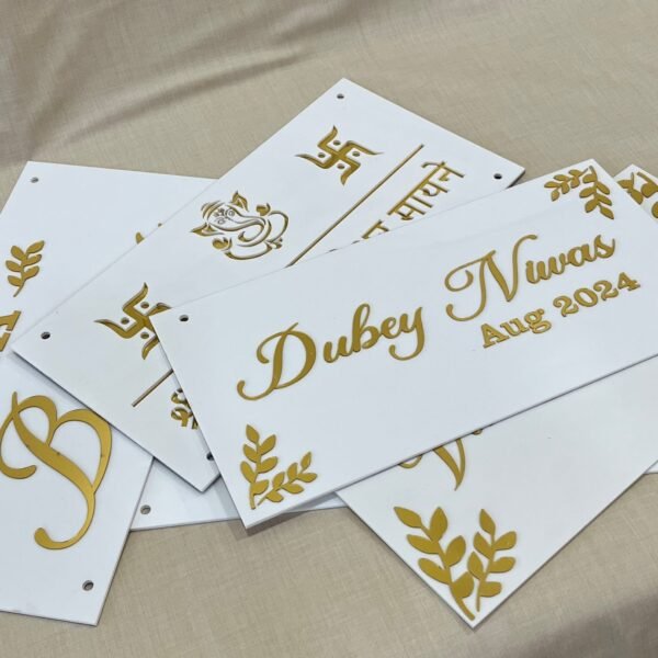 IMG_4561 multiple Personalized Acrylic Name Plates in white and gold with leaf design on diagonal corners