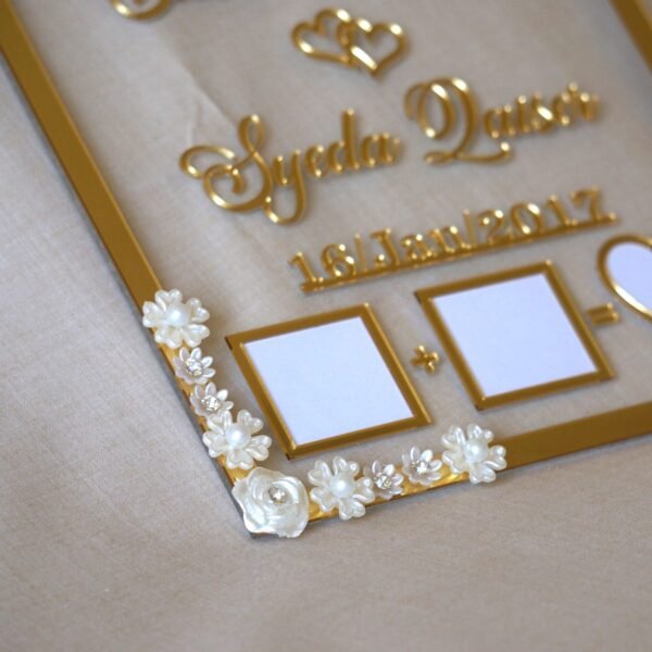 DSC06879 close up photo of nikah thumb board in golden color with floral embellishments