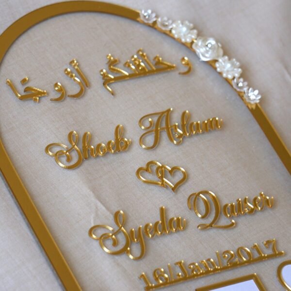 DSC06880 close up photo of nikah thumb board in golden color with floral embellishments
