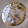 round nikah thumb plate for wedding ceremony made using golden and transparent acrylic sheets, the size of this product is 10 by 10 inches