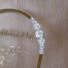 wedding thumb print frame in dome shape with floral embellishments and made with transparent and silver acrylic