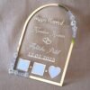 wedding thumb print frame in dome shape with floral embellishments and made with transparent and silver acrylic
