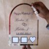 wedding thumb print frame in dome shape with floral embellishments and made with transparent and silver acrylic
