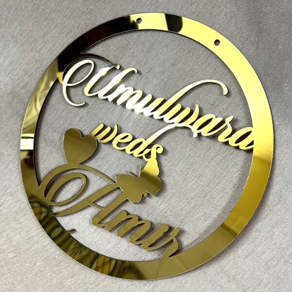 IMG_1280 Golden round wall hanging with couple's name. Acrylic and MDF.