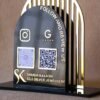 Acrylic QR stand with a golden grilled background for a premium look, this QR code stand is used for connecting with clients on social media and receiving payments seamlessly.