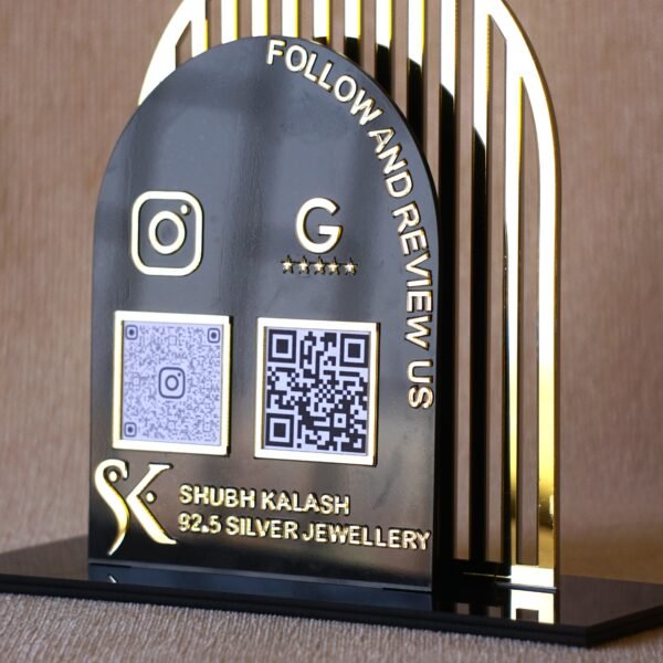 1740235489718 Acrylic QR stand with a golden grilled background for a premium look, this QR code stand is used for connecting with clients on social media and receiving payments seamlessly.