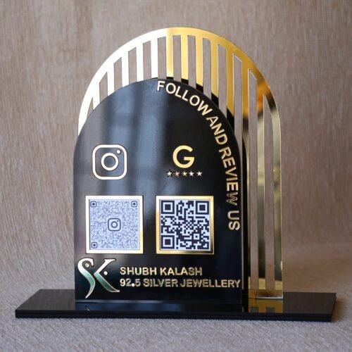 Acrylic QR stand with a golden grilled background for a premium look, this QR code stand is used for connecting with clients on social media and receiving payments seamlessly.