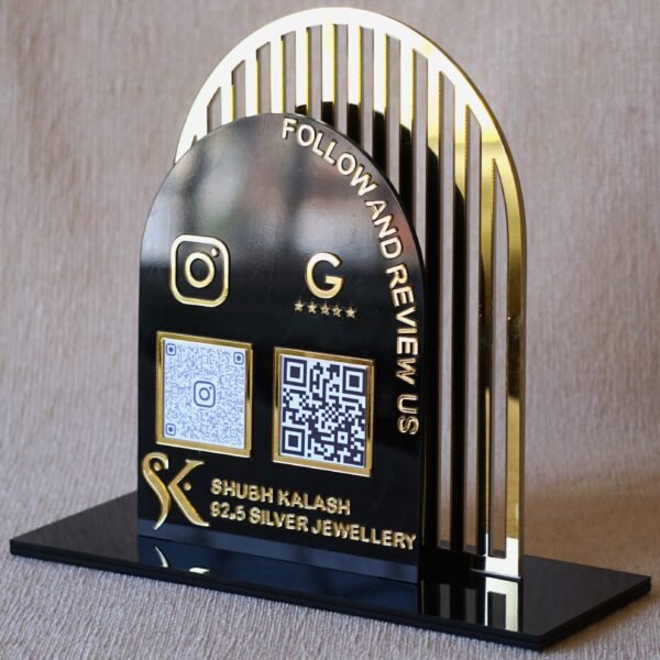 1740235489857 Acrylic QR stand with a golden grilled background for a premium look, this QR code stand is used for connecting with clients on social media and receiving payments seamlessly.
