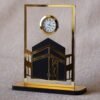 Islamic desk clock in Kaaba design, this product is made using acrylic, and this is used as a clock for an office desk, or it can be displayed on a shelf. It can be a perfect gift for Muslims.
