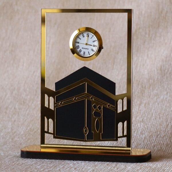 1742134359432 Islamic desk clock in Kaaba design, this product is made using acrylic, and this is used as a clock for an office desk, or it can be displayed on a shelf. It can be a perfect gift for Muslims.