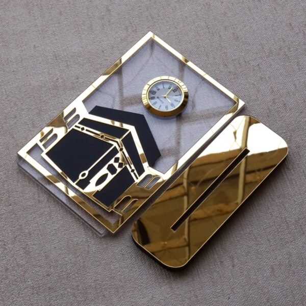 1742134359625 Islamic desk clock in Kaaba design, this product is made using acrylic, and this is used as a clock for an office desk, or it can be displayed on a shelf. It can be a perfect gift for Muslims.