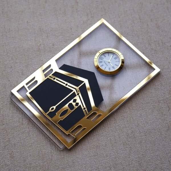 1742134359676 Islamic desk clock in Kaaba design, this product is made using acrylic, and this is used as a clock for an office desk, or it can be displayed on a shelf. It can be a perfect gift for Muslims.