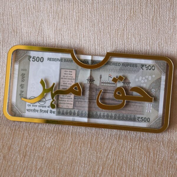 DSC07562 Customizable haq mahr gift envelope in golden and transparent colors; it can hold up to 20 notes. This envelope is perfect for elegantly presenting gift money, creating a memorable impression with a customizable name.