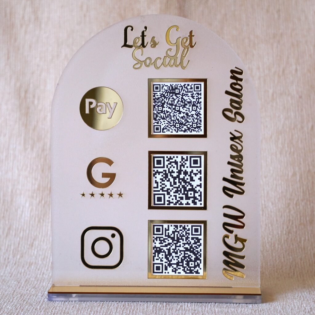 qr code scan stand in white and pink with payment and social media option