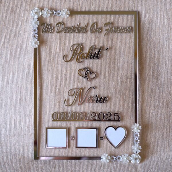 1741871520948 Transparent & silver acrylic personalized wedding thumbprint frame with floral corner embellishments, embossed bride and groom names and date, plus dedicated thumbprint spaces.
