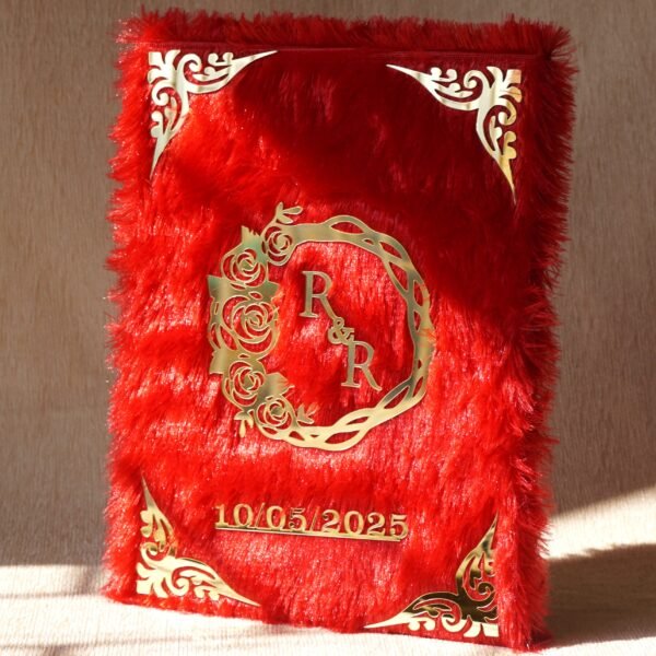 DSC07740 A red fur–clad nikah nama booklet with an acrylic cover and MDF backing, opened to blank pages for the bride’s and groom’s thumbprints and signatures as a lasting wedding keepsake